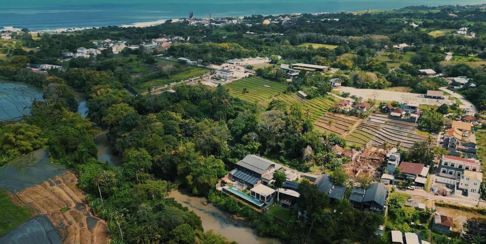 Aya Studios Bali — aerial view of the studio nestled by the river